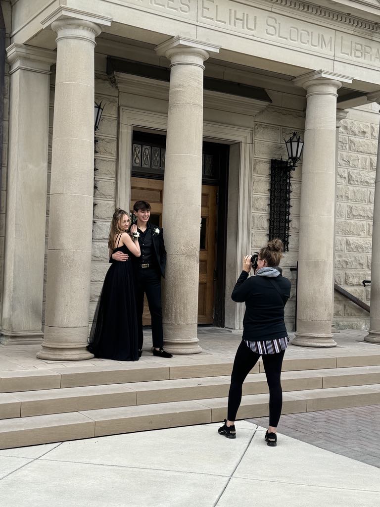 Betsy photographing a session