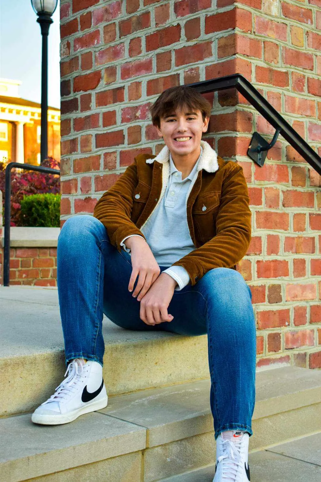 Senior portrait with natural outdoor backdrop